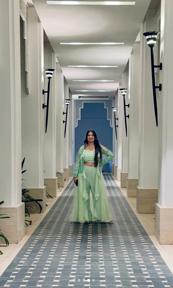 Featured full length mint outfit in hallway