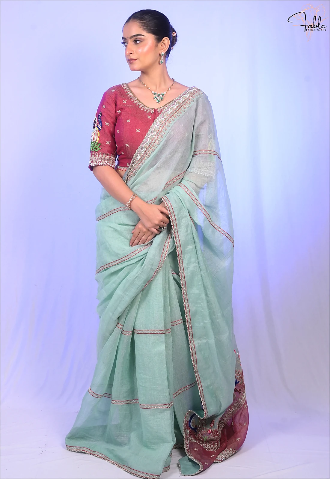 Shreenathji art saree with peacock-inspired details